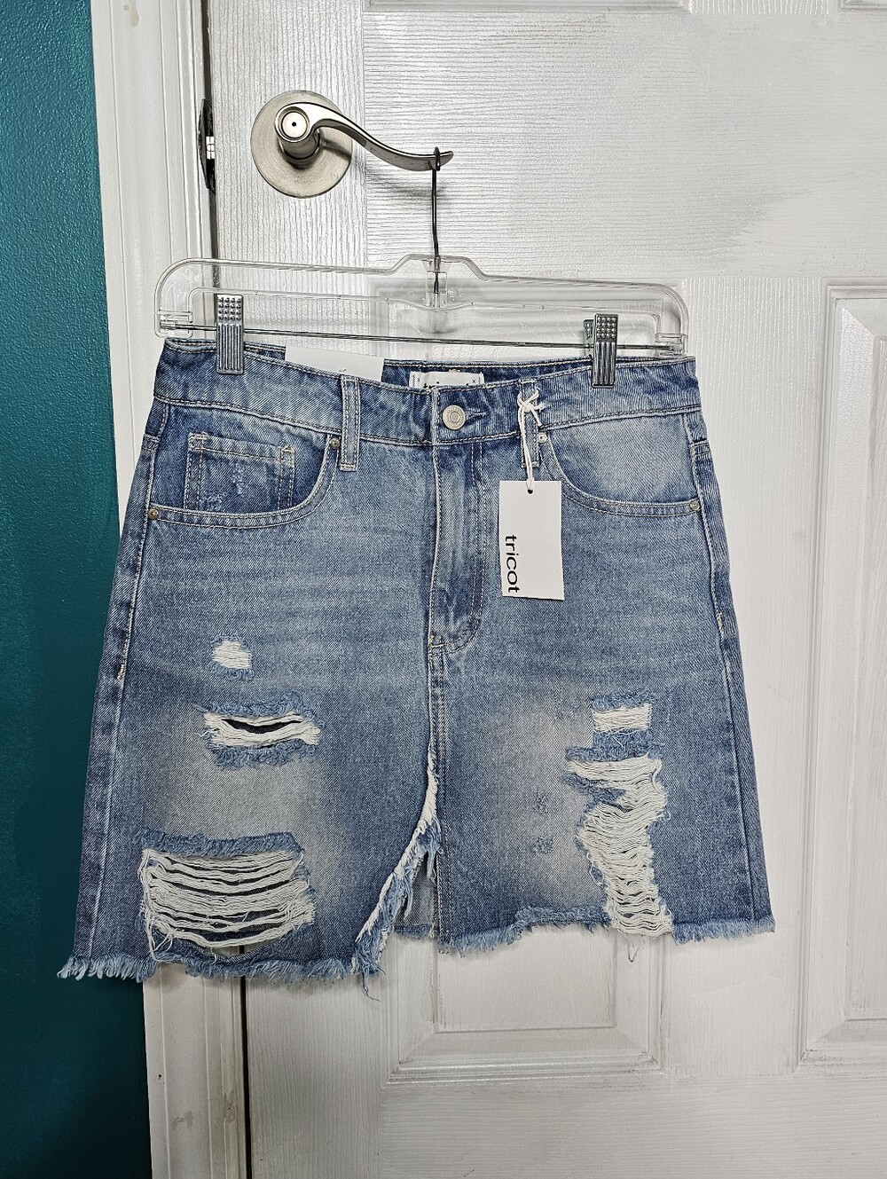 Tricot Light Wash Distressed Denim Skirt With Frayed Hemline